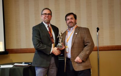 Matt Shiefer accepting the Distinguished Alumni Award